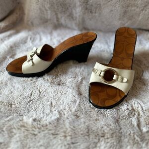 Coach “Eliza” size 6 white & black wedge heel with silver detail. 3.5” heel.